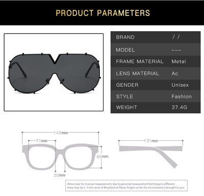 Oversized V-shaped sunglasses with a gold metal frame, white accents, clear lenses, and decorative rivets. - Image 24
