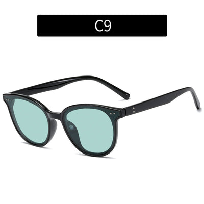 Jelly yellow frame sunglasses with green lenses, featuring a rounded cat-eye shape for UV protection and fashion. - Image 8