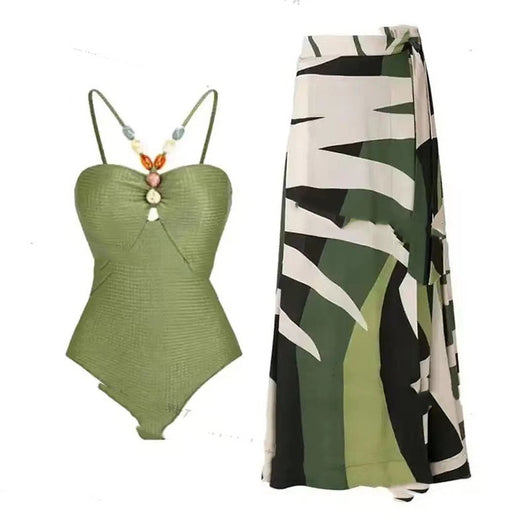 Women's olive green ribbed one-piece swimsuit with colorful beaded straps and matching abstract print sarong skirt. - Image 11