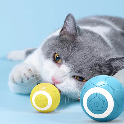 Yellow electric pet toy ball with a soccer ball pattern and a white ring around a central power button. - Image 2
