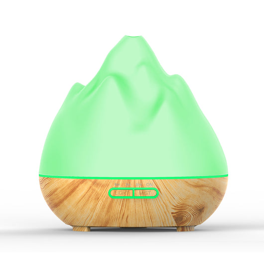 Mountain View Volcano Aroma Diffuser Mini Humidifier with blue LED light and dark wood grain base. - Image 13