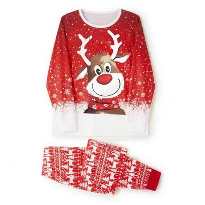 Family of four wearing matching red Christmas pajamas with reindeer and snowflake patterns and red pom-pom beanies. - Image 5