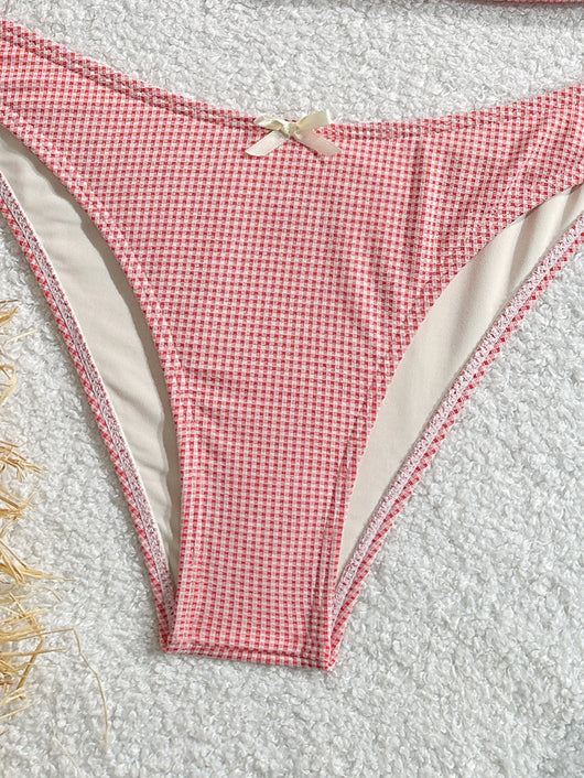 Gingham two-piece swimsuit with a camisole top featuring ruffled trim and a bow, paired with high-cut bikini bottoms. - Image 3