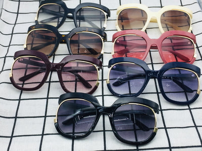 Black cat-eye half-frame sunglasses with gold accents and purple-grey gradient lenses, shown from front and side. - Image 8