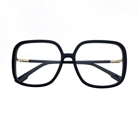 Black oversized square anti-blue light glasses with clear resin lenses and gold metal frame details, held by a hand. - Image 6