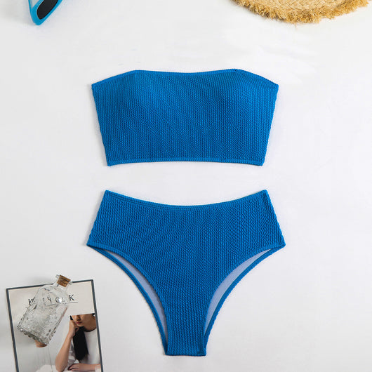 Blue high-waisted bikini set with a textured bandeau top and high-cut bottoms, laid flat on white. - Image 19