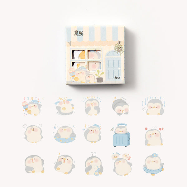 Set of 45 cute penguin paper stickers with various expressions and poses, packaged in a decorative shop-front box.