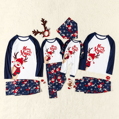 Matching family Christmas pajamas with white and navy blue long-sleeve tops, reindeer print, and "Merry Xmas!" text. - Image 19