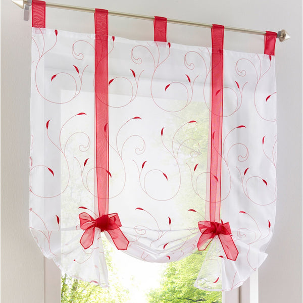 White sheer Roman window screen with red embroidered floral patterns and red ribbon ties, hanging from a silver rod.