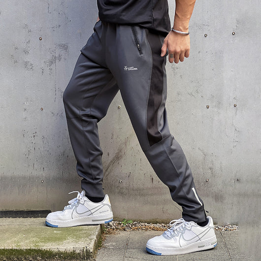 Pantalones de Chándal con Bolsillos de Cierre y Tela Elástica - Image 2