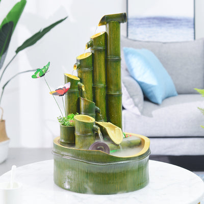 Green bamboo-themed indoor water fountain with multiple tiers, a water wheel, and small frog and butterfly accents. - Image 11