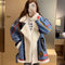 Chaqueta de Plumón de Cordero para Mujer - Abrigo Elegante y Versátil