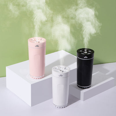 Gray cylindrical USB aromatherapy humidifier with a silver band and car icon on top, designed for car use. - Image 14