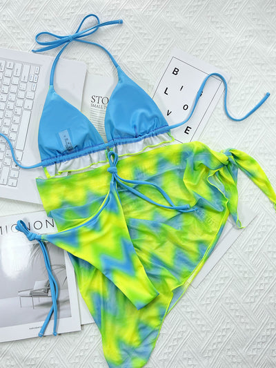 Vibrant green and blue tie-dye bikini set with a matching sarong cover-up, featuring halter top and tie-side briefs. - Image 5