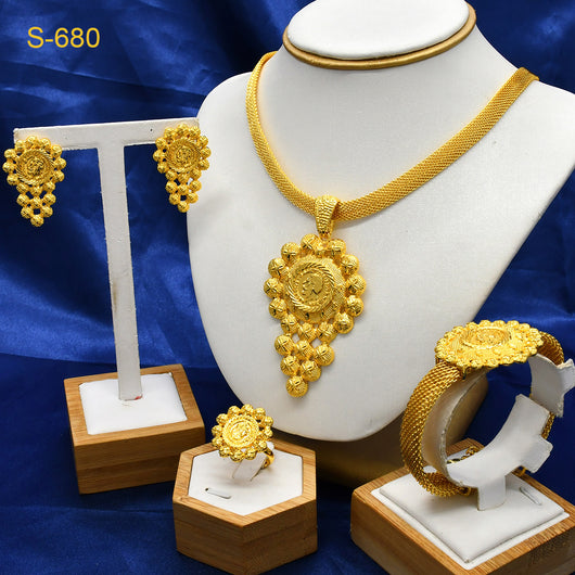 Gold-colored four-piece jewelry set with mesh texture: necklace, drop earrings, bracelet, and ring, all with knot design. - Image 7