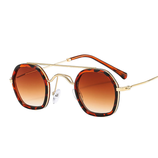 Green hexagonal frame sunglasses with blue to peach gradient lenses and gold-tone double bridge and temples. - Image 17