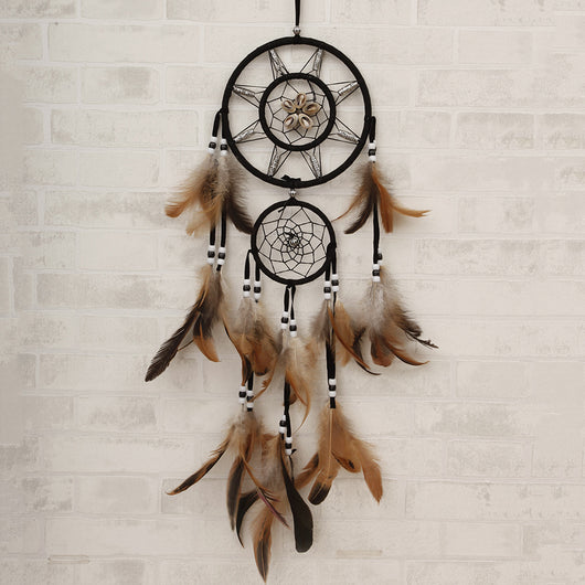 Bohemian dreamcatcher wind chime with black hoops, brown and tan feathers, and black and white beads. - Image 8