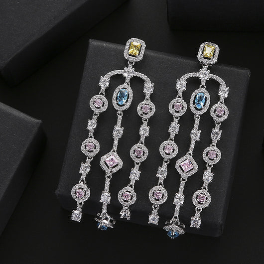 Aretes Largos de Cobre con Circonita Geométrica y Borla para Mujer - Image 4