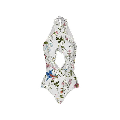 White one-piece swimsuit with red rose print and matching sarong skirt with red tie waist. - Image 9