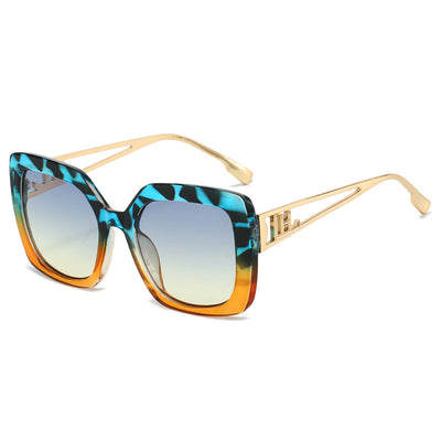 Women's square fashion sunglasses with red and green gradient tortoise shell frames and gradient purple-to-yellow lenses. - Image 11