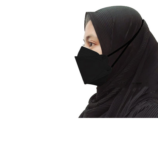 Orange KF94-style headloop face mask worn by an adult with a black hijab, designed for respiratory protection. - Image 3