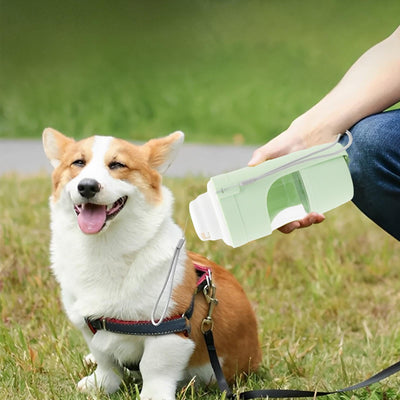 White 2-in-1 travel dog water bottle and food dispenser with a clear compartment and gray lanyard for pets. - Image 5