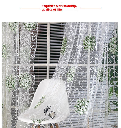 Sheer white European-style floral curtain with brown and gold patterns, hung on a gold rod in a bedroom. - Image 9