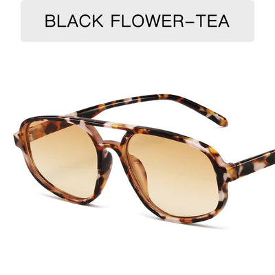 Men's fashion tortoise shell double beam sunglasses with brown oval lenses on a white background. - Image 8