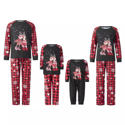 Family matching Christmas pajamas with black long-sleeve tops featuring reindeer and red plaid pants with snowflakes. - Image 7
