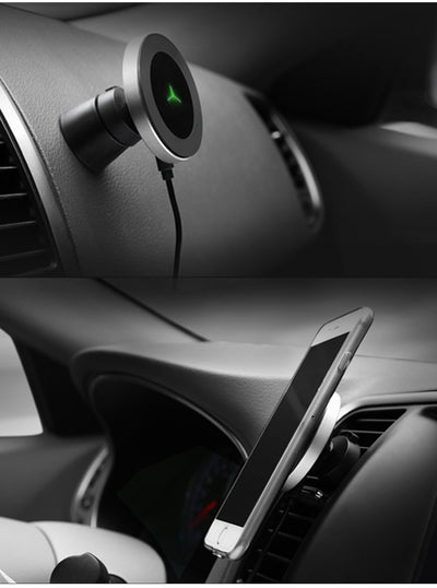 Silver and black car magnetic wireless charger with a blue indicator light, mounted on a car's air vent. - Image 13