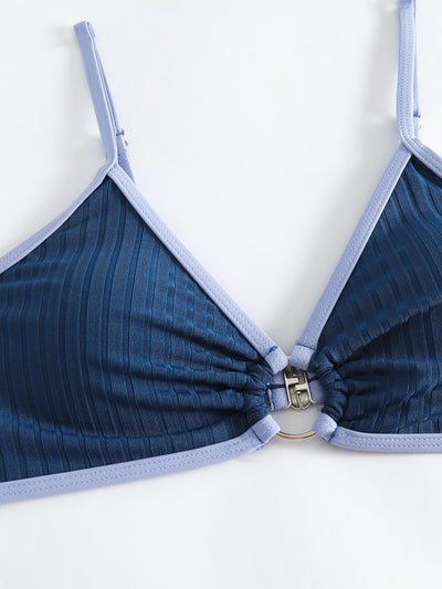 Women's dark blue ribbed two-piece swimsuit with light blue trim, triangle top, and high-cut bikini bottom. - Image 16