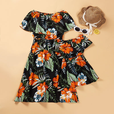 Family matching Hawaiian outfits: men's shirt and shorts, women's off-shoulder maxi dress, girl's dress, boy's shirt and shorts, all with black, orange hibiscus - Image 9