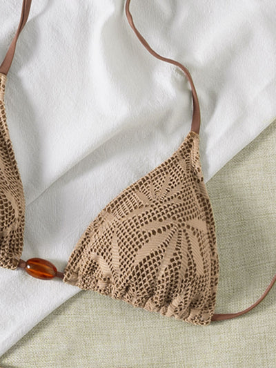 Light brown crochet bikini set with leaf pattern, strappy ties, and an amber bead accent, displayed on a light background. - Image 9