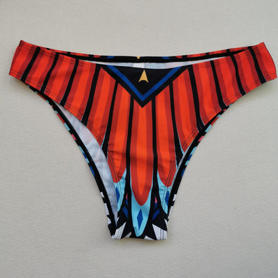 Women's long-sleeve crop top and high-waisted bikini set with a vibrant red, blue, black, and white feather-like geometric pattern. - Image 2