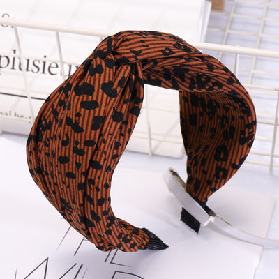 Diadema Cruzada Estampado Leopardo Negro y Blanco con Aro - Image 10
