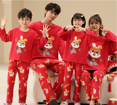 Family of four wearing matching yellow long-sleeved cotton pajamas with a cute panda design and "HUG ME!" text. - Image 2