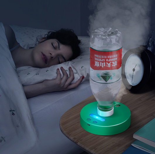 White round portable USB humidifier with a night light, single fog outlet, and two control buttons. - Image 10