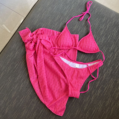 White textured bikini with ruched triangle top, high-cut bottom, and matching sarong with a large bow. - Image 4