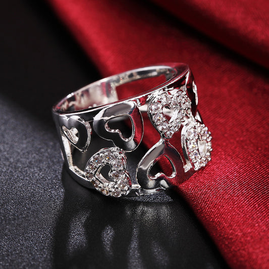 Anillo Corazón Calado con Diamantes
