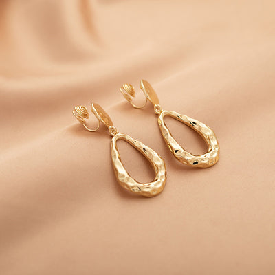 Aretes Colgante Gota de Agua Hueca Dorados Estilo Fashionable