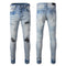 Calça Jeans Masculina Azul Clara Rasgada com Apliques de Couro Preto