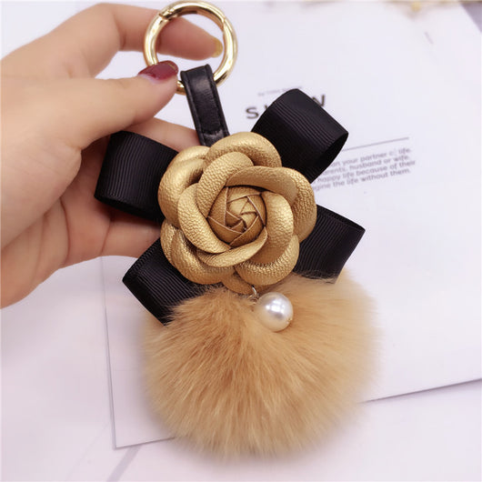 Llavero Decorativo Flor Camelia con Moño para Bolsa de Mujer - Image 12