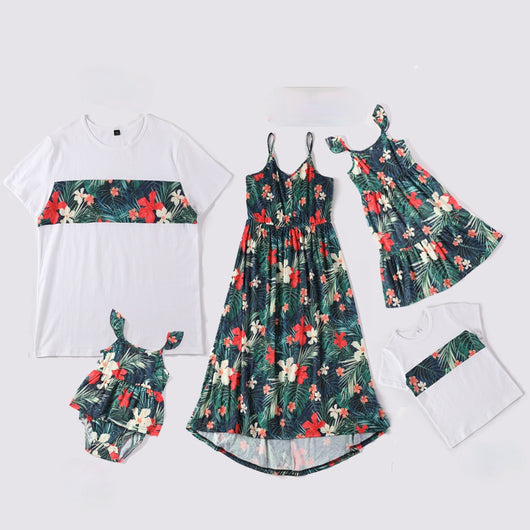 Child's white short-sleeve t-shirt with a horizontal tropical leaf and orange flower print band across the chest. - Image 4