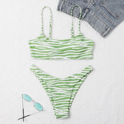 Tan and white zebra stripe two-piece bikini with a bandeau top and high-cut bottom, laid flat. - Image 8
