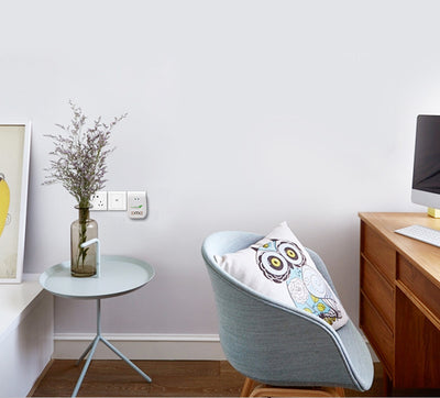 White and light blue plug-in air purifier with a leaf logo and 'Rnai Purifier' text on the front. - Image 5