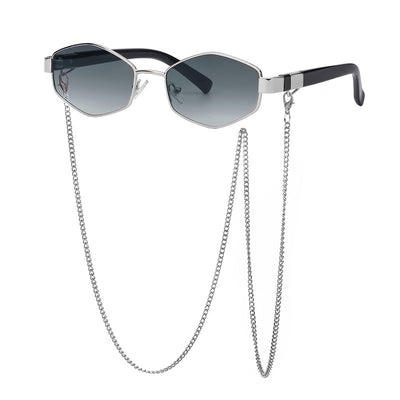 Women's hexagonal sunglasses with dark lenses, gold-colored metal frame, black temples, and a detachable gold chain. - Image 3