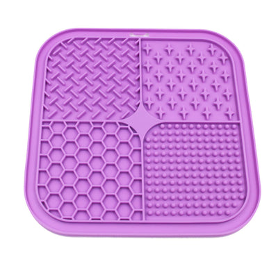 Gray silicone pet licking pad with four textured sections, designed for slow feeding and anti-choking. - Image 40