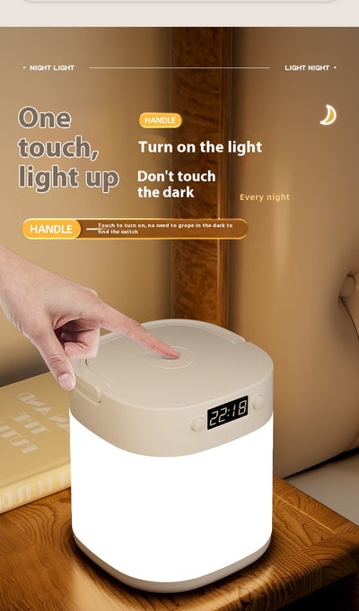 White rechargeable LED table lamp with a digital clock display and a light gray carrying handle. - Image 6