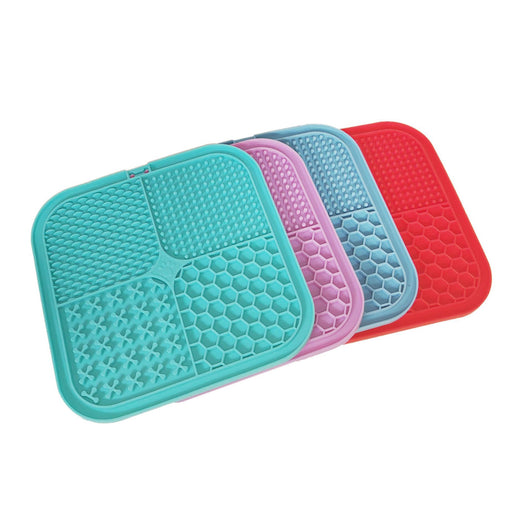Gray silicone pet licking pad with four textured sections, designed for slow feeding and anti-choking. - Image 30