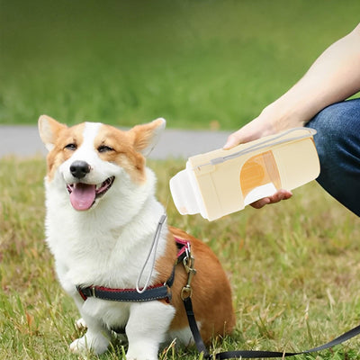 White 2-in-1 travel dog water bottle and food dispenser with a clear compartment and gray lanyard for pets. - Image 4